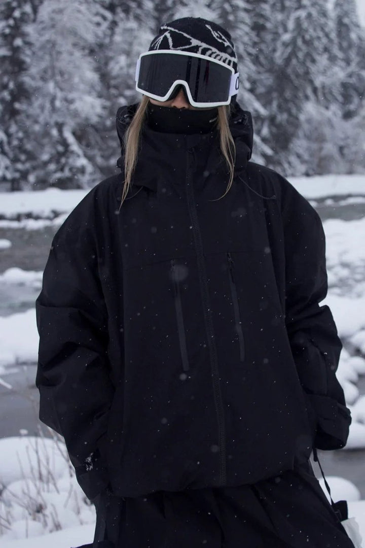 Close-up of the waterproof zipper on a unisex ski jacket, highlighting durable construction for rugged winter conditions.