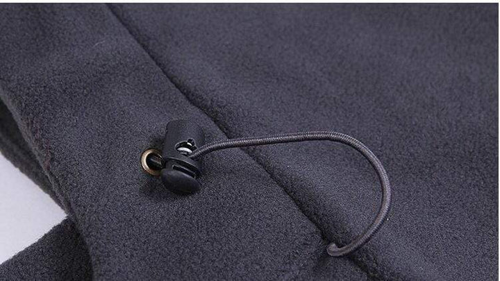 Detailed view of thermal balaclava's breathable fabric, perfect for outdoor gear and ski adventures