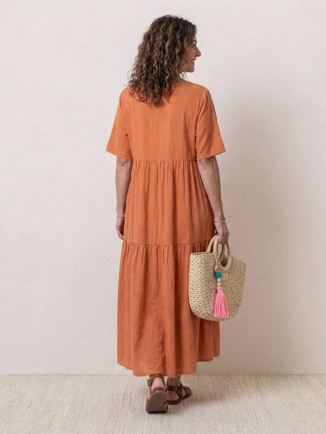 Elegant women's boho dress, V-neck tiered design, long & graceful. Great for special events.