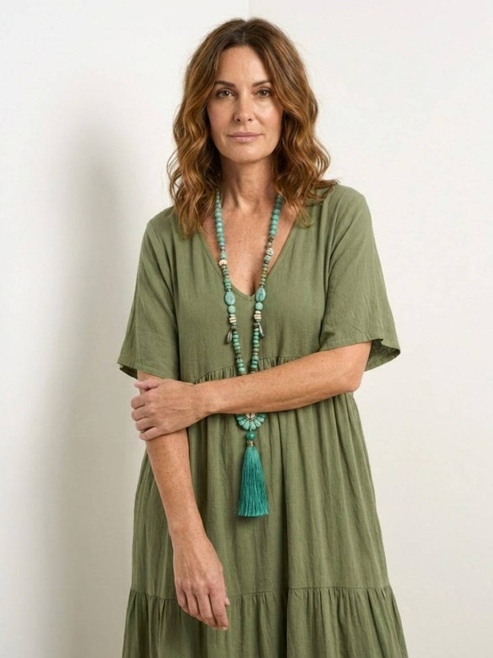 Vacation-ready women's boho maxi dress, V-neck tiered design, long & comfortable.
