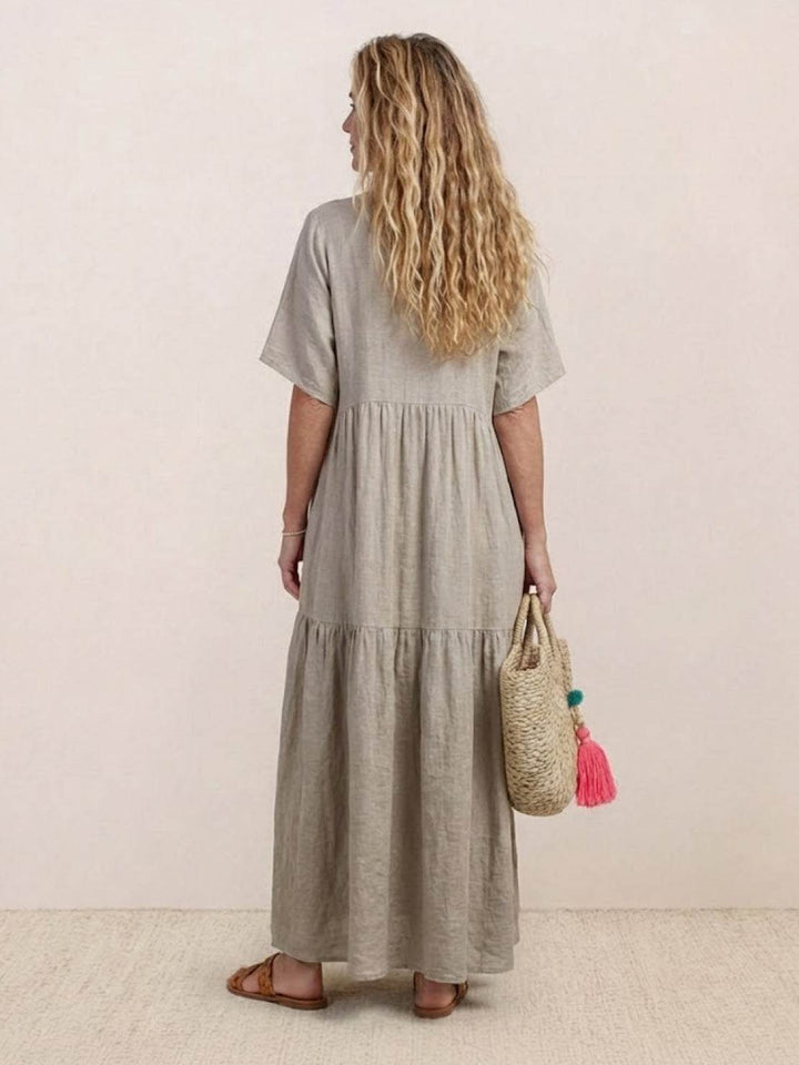 Comfortably chic women's V-neck tiered maxi dress, boho casual & elegant.