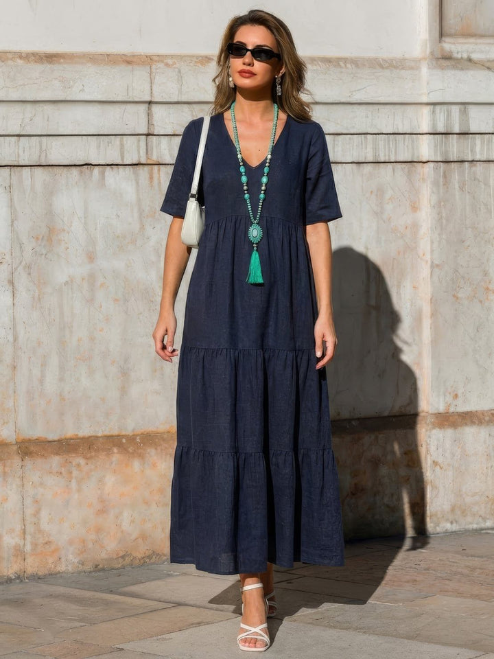 Long V-neck tiered flowy gown for women, a stunning boho dress for any wardrobe.