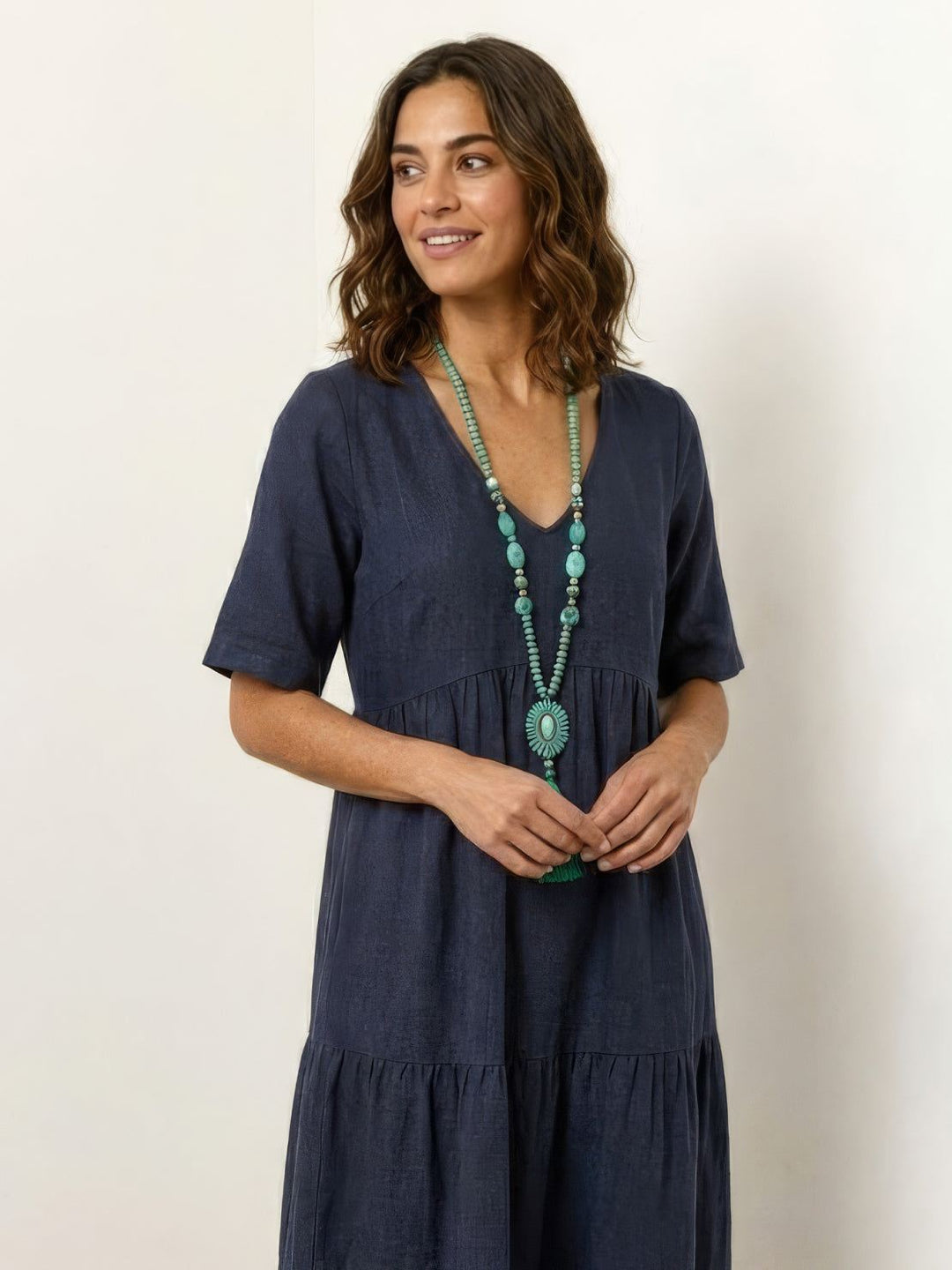 Casual women's V-neck tiered maxi dress, flowy boho style, great for everyday comfort.