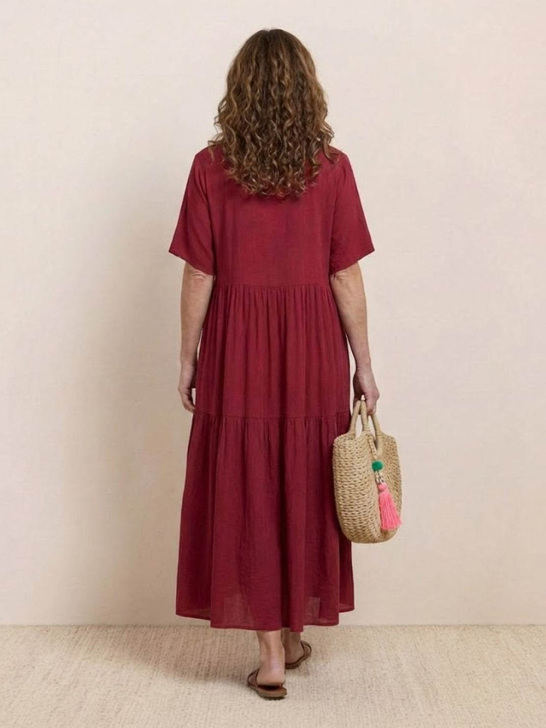 Summer women's V-neck tiered maxi dress, lightweight bohemian for beach & vacation.