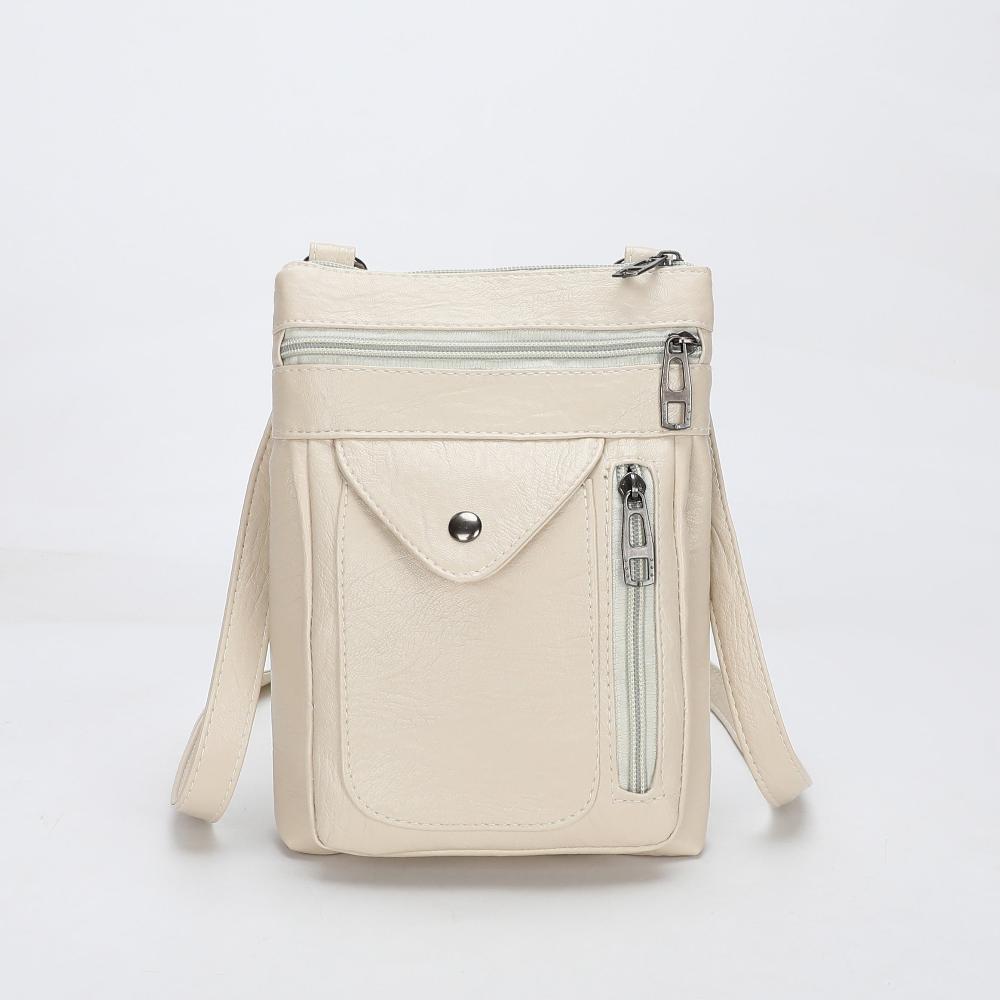 Brown vintage daily crossbody bag for women, offering both style and utility.