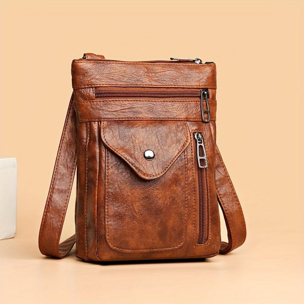 Chic women's vintage shoulder bag, a black crossbody purse for daily fashion.