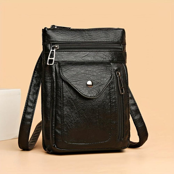 Elegant vintage women's brown crossbody bag, a timeless accessory for daily wear.