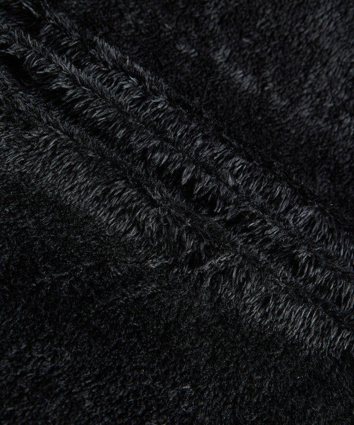 Black insulated men's winter jacket, sherpa-lined, designed for ultimate warmth and durability
