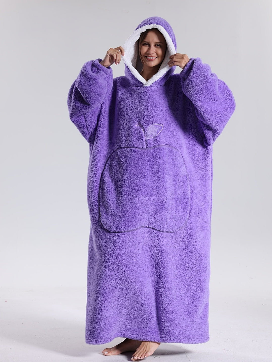 Versatile unisex wearable blanket, combining a hoodie's style with luxurious blanket comfort.