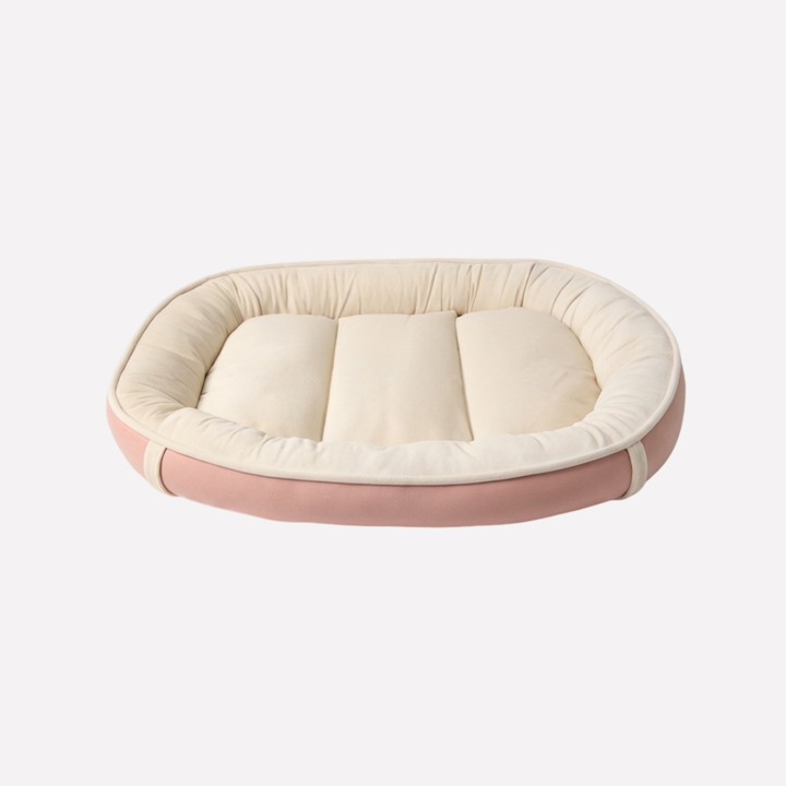 Plush, washable dog bed for small & large pets. Cozy nest design provides ultimate pet comfort & support.