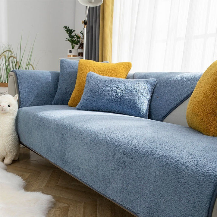 Waterproof thick fleece non-slip sofa cover in grey, protecting your couch from spills and pets.