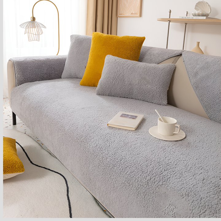 Durable & washable waterproof fleece couch cover with non-slip backing, perfect home decor for busy families.