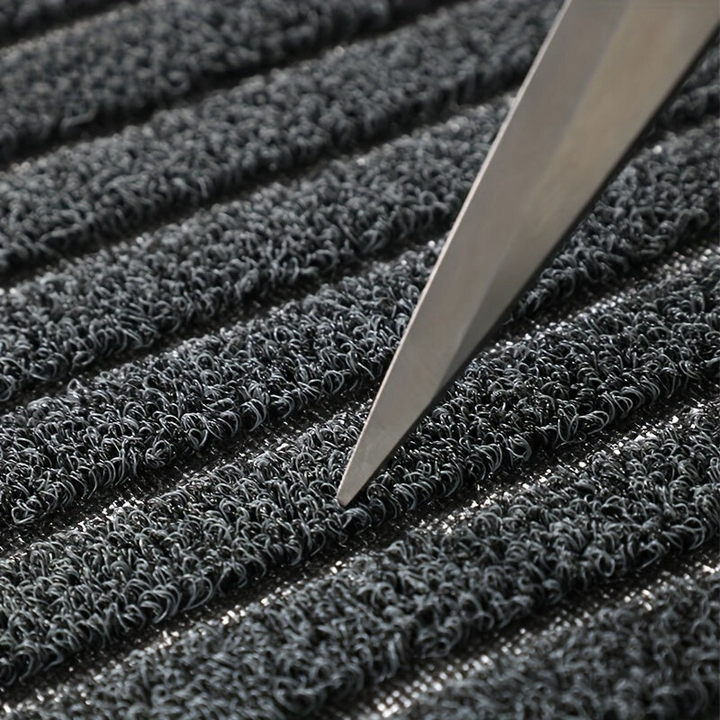 Functional outdoor patio doormat, also great for indoor entryways. Durable dirt trapping floor mat keeps home clean.