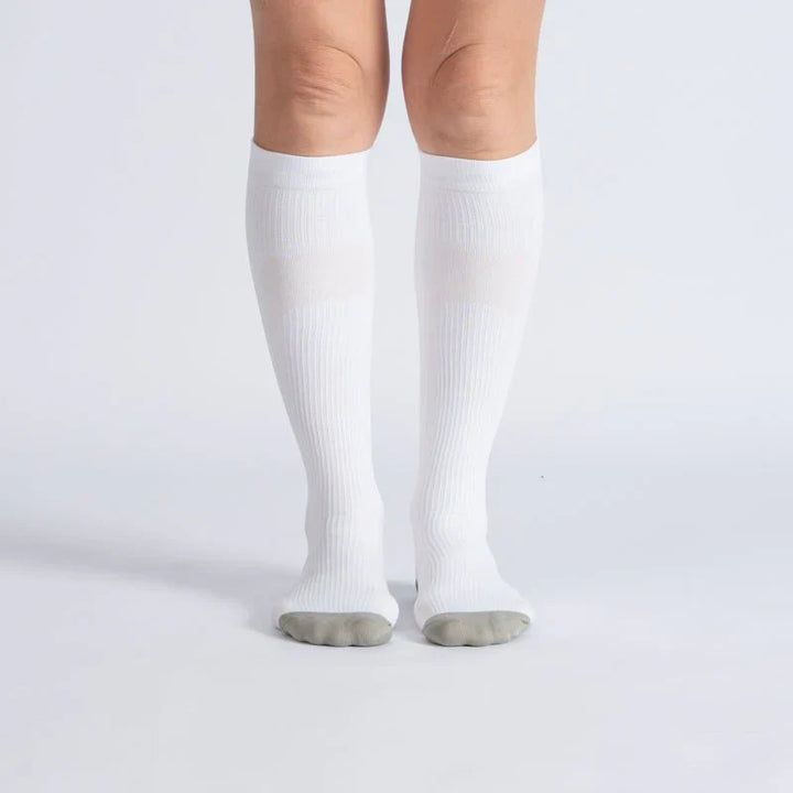 White & gray unisex gentle compression socks, close-up for comfort, support, circulation, athletic