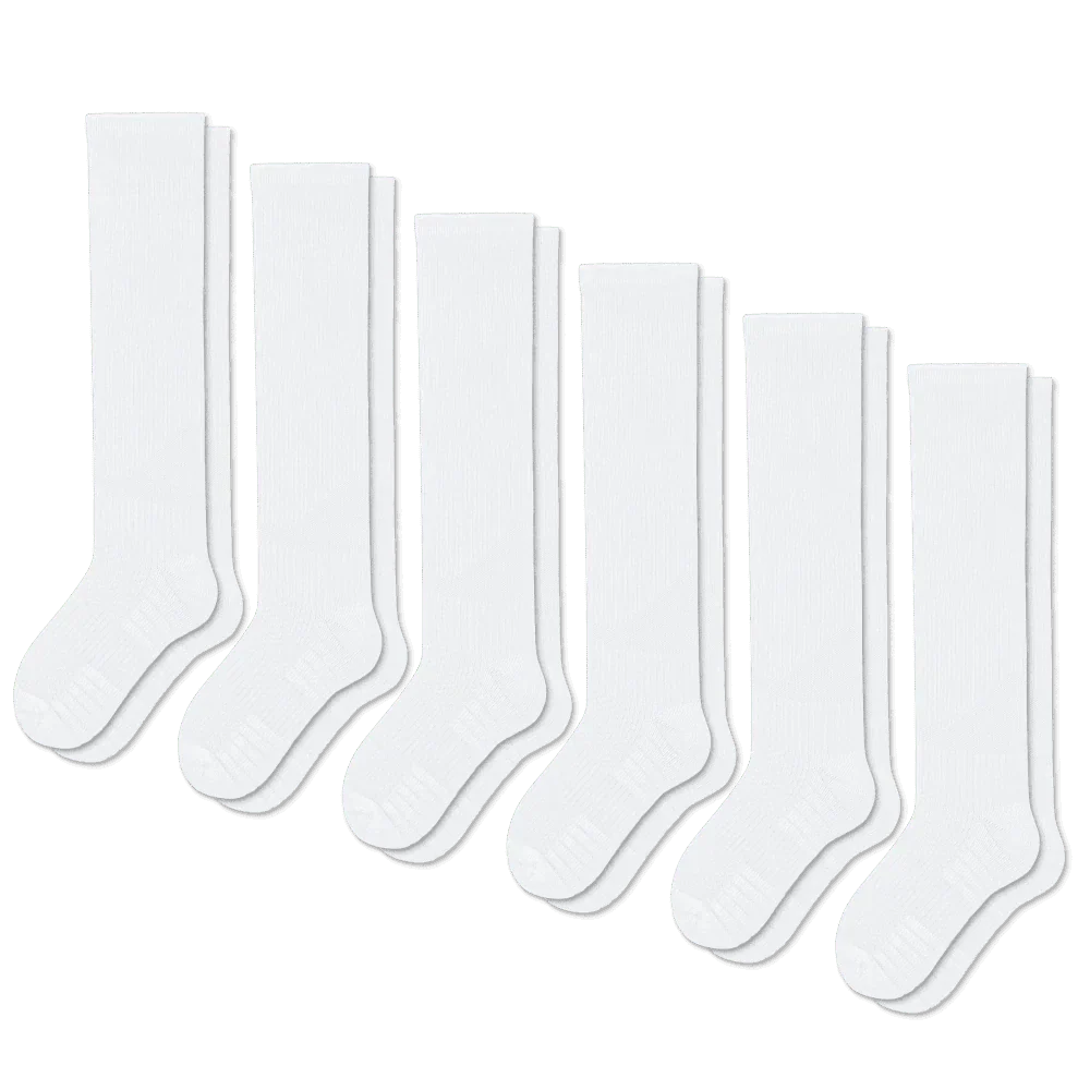 Close-up of a white gentle compression sock, highlighting the comfortable knit for leg support