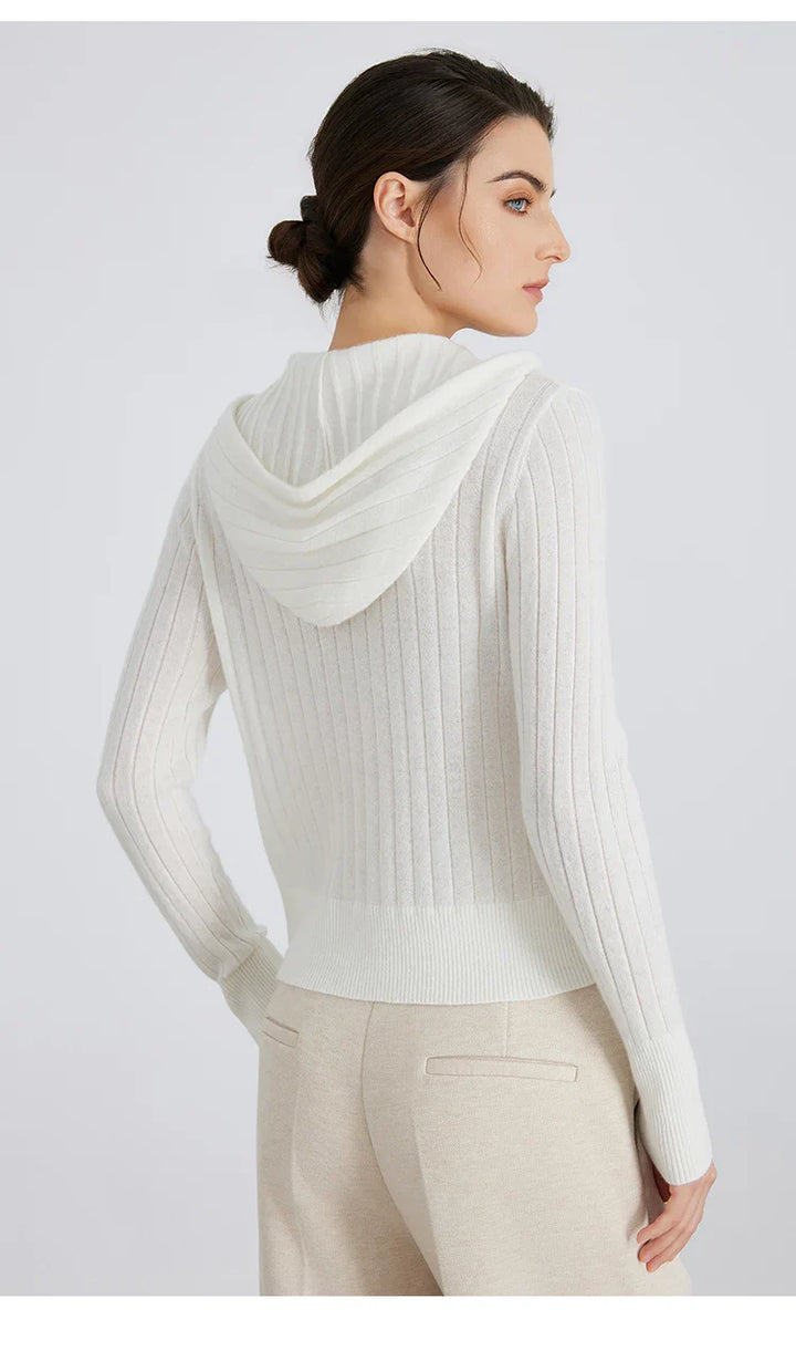 Detailed shot of the hood and collar on a women's ribbed full-zip knit cardigan.