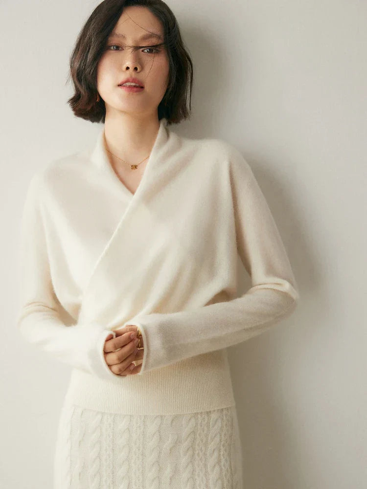 Luxurious red cashmere women's sweater, sophisticated crossover style