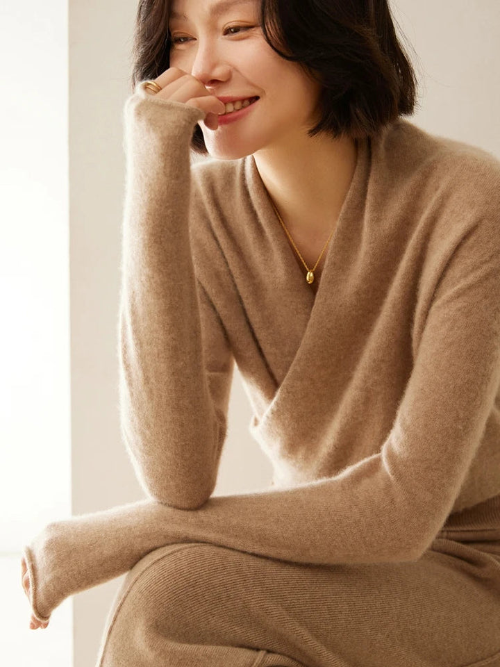 Luxurious ivory cashmere crossover sweater, effortlessly stylish knitwear