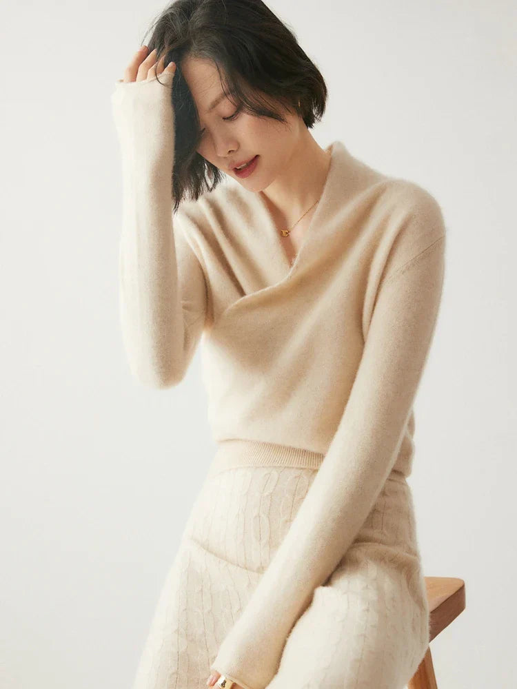 Luxurious pink cashmere women's sweater, draped crossover style