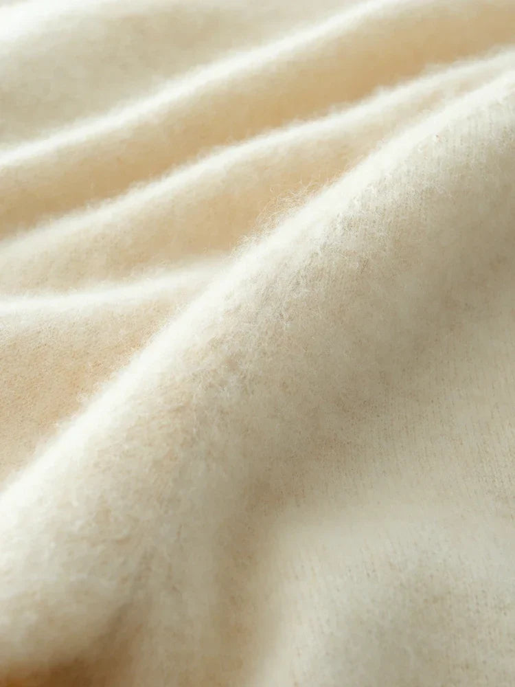 Stylish women's beige cashmere crossover sweater, relaxed knitwear