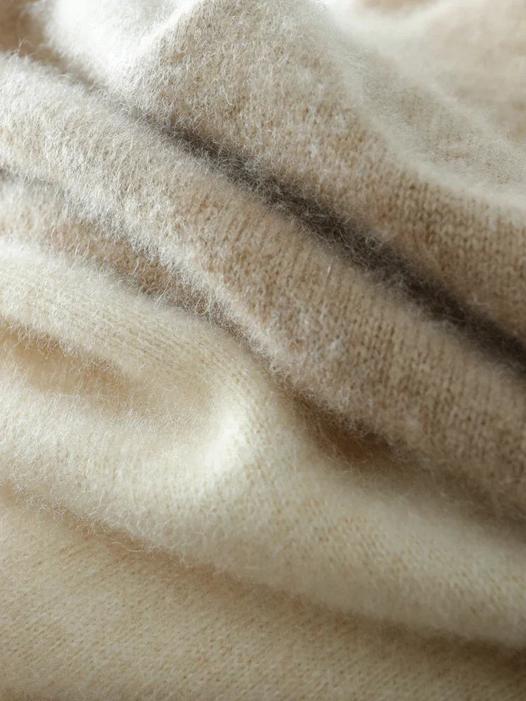 Elegant women's cashmere crossover sweater, luxurious knitwear collection