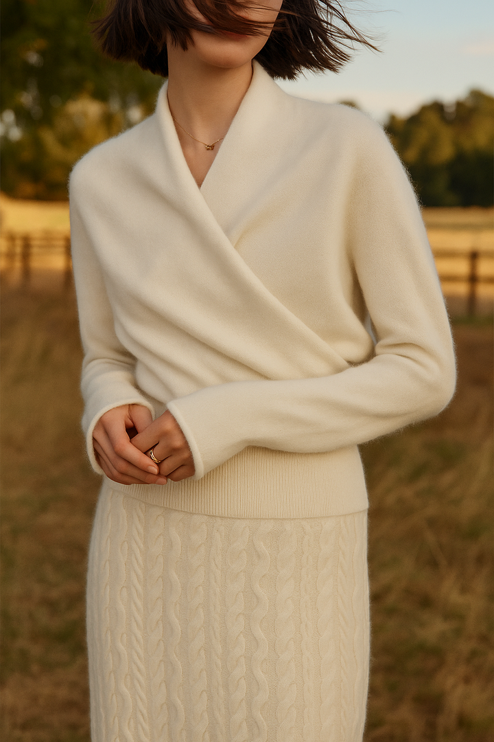 Mannequin displaying a luxurious cashmere crossover sweater, warm knitwear