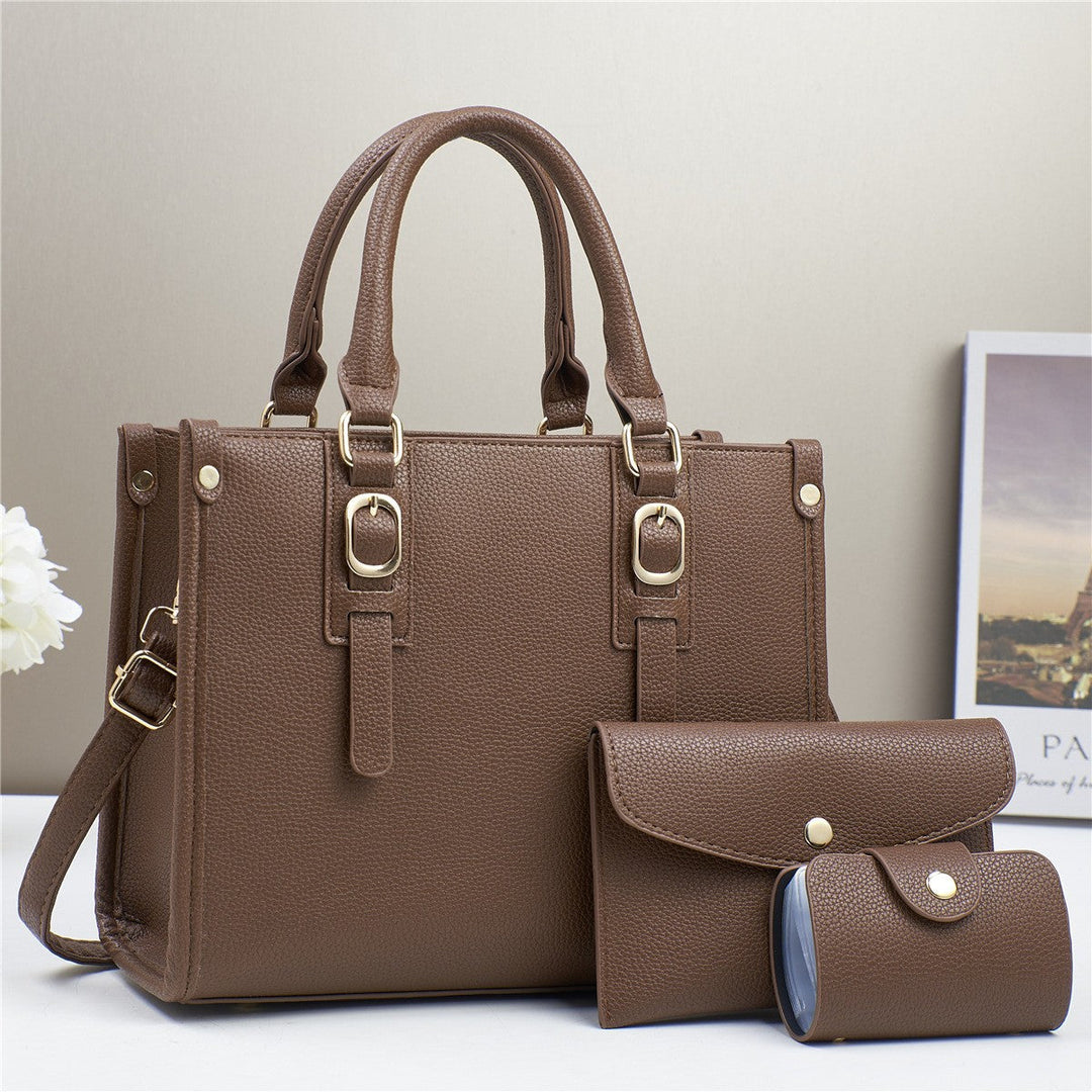 Orange women's convertible handbag set, features tote, shoulder bag, and wallet, a bold fashion statement.