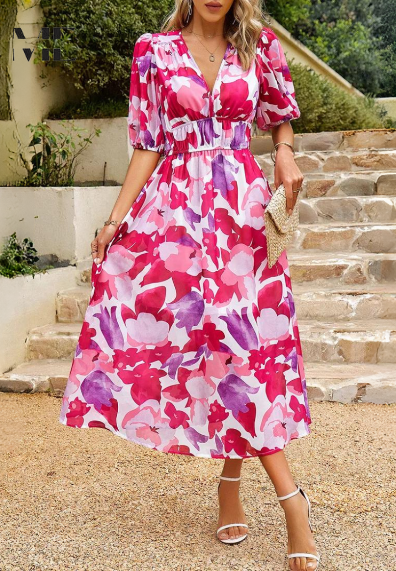 Fashionable women's midi dress with an eye-catching abstract pattern and belt.