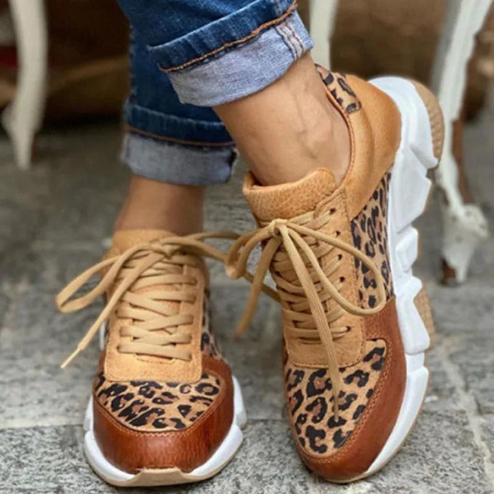 Comfortable women's animal print lace-up sneakers, perfect for everyday wear and streetwear style.