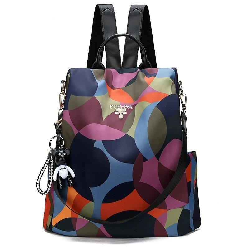 Women's anti-theft backpack, water-resistant Oxford fabric, stylish daily travel bag with concealed zipper.
