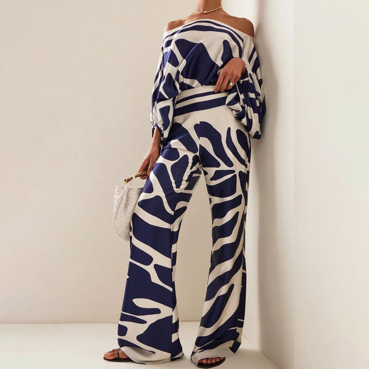 Abstract printed one-shoulder women's set, featuring a stylish top and wide-leg pants for a fashion statement.
