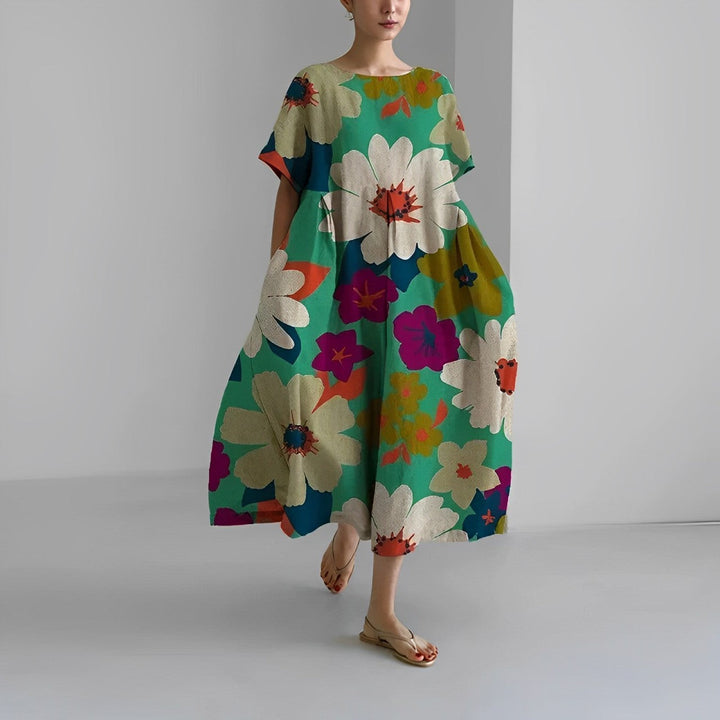 Boho-inspired flowy midi dress for women, featuring a unique artistic print, relaxed fit, and comfortable design.