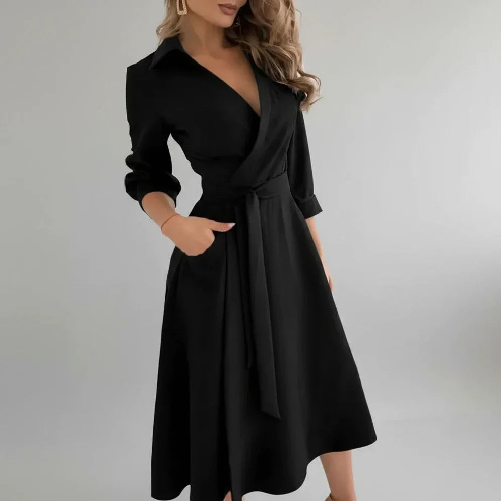Flattering women's belted A-line midi dress with V-neck. An elegant and casual option for various occasions.