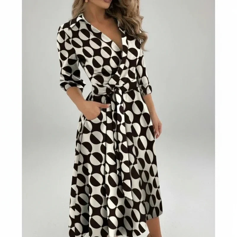 Women's belted A-line midi dress, featuring a V-neck. Versatile and flattering for any casual or day occasion.