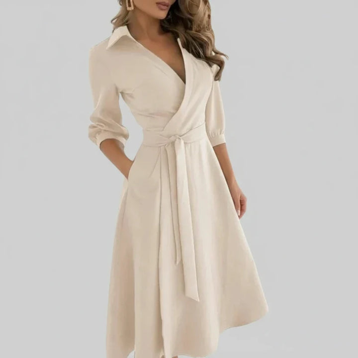 Versatile women's belted A-line midi dress. Flattering V-neck design, perfect for casual, elegant, or work outfits.