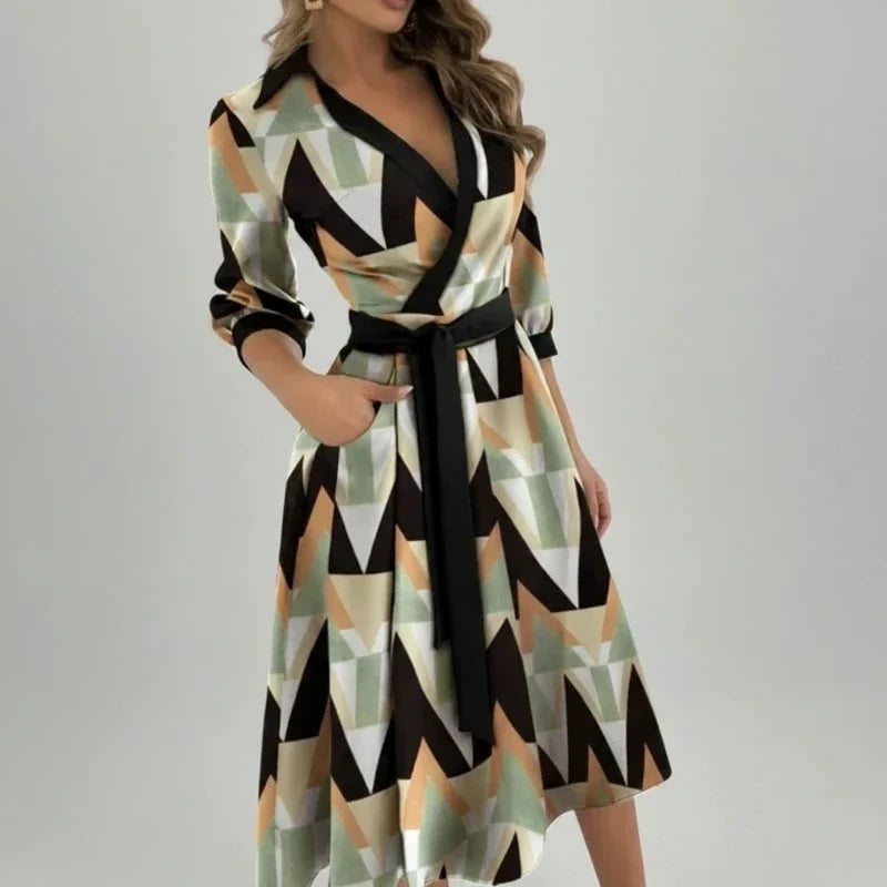Comfortable and elegant women's midi dress. Belted A-line style, V-neck, perfect for summer casual or day wear.