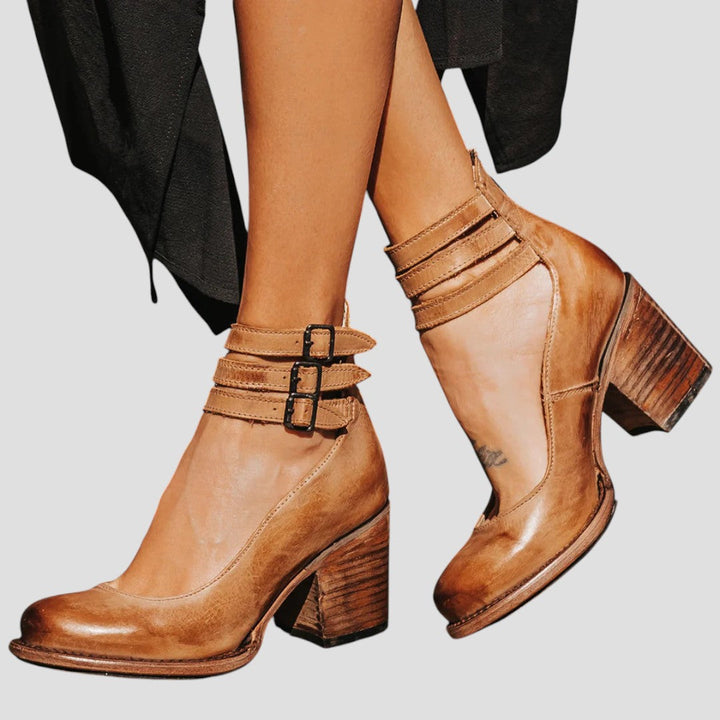 Comfortable women's block heels, closed toe, buckle strap. Versatile for work, formal, or elegant occasions.