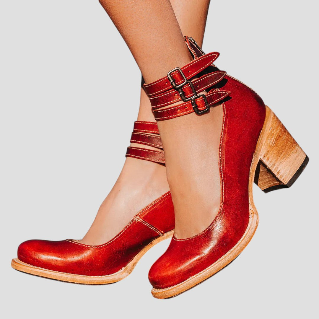 Chic women's block heels with a sophisticated closed toe and secure buckle strap. Perfect for formal wear.