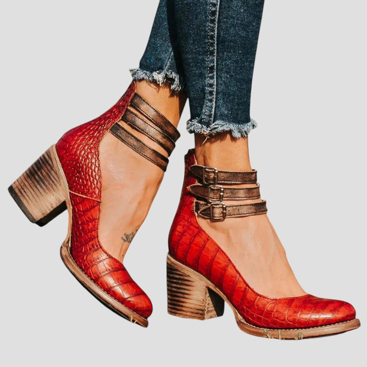 Sturdy block heels for women with a closed toe and secure buckle strap. Chic & comfortable formal footwear.