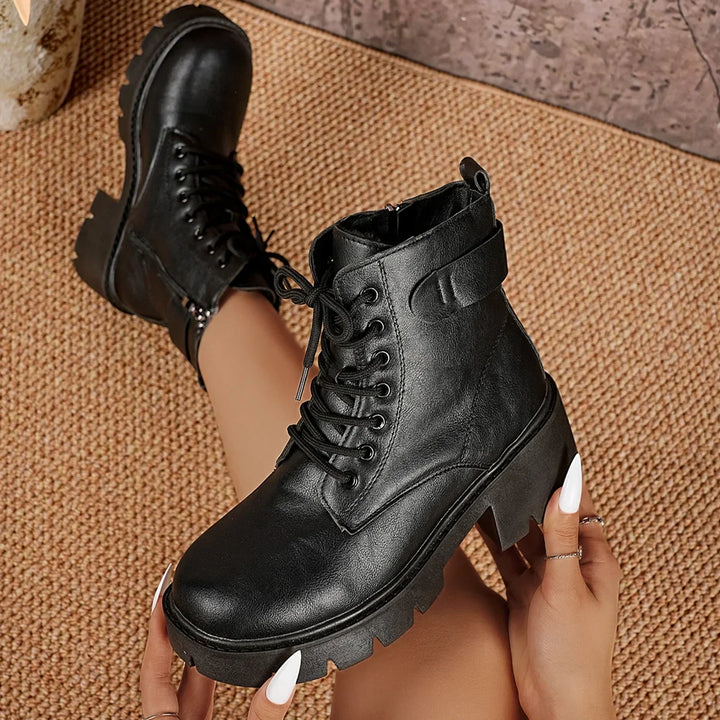 Comfortable women's black chunky lace-up ankle boots. Versatile & stylish footwear with a bold sole.