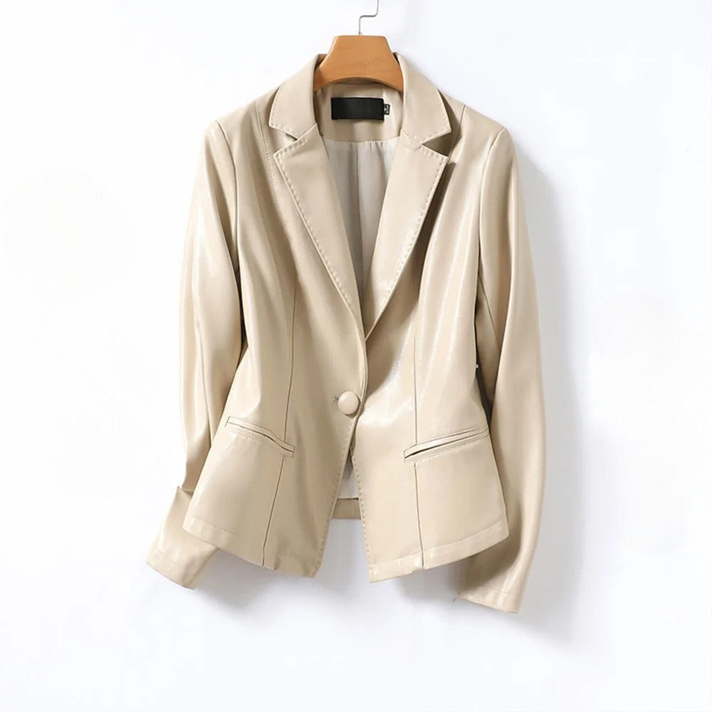 Full shot of a women's black vegan leather blazer, highlighting its sleek design and flattering fit.