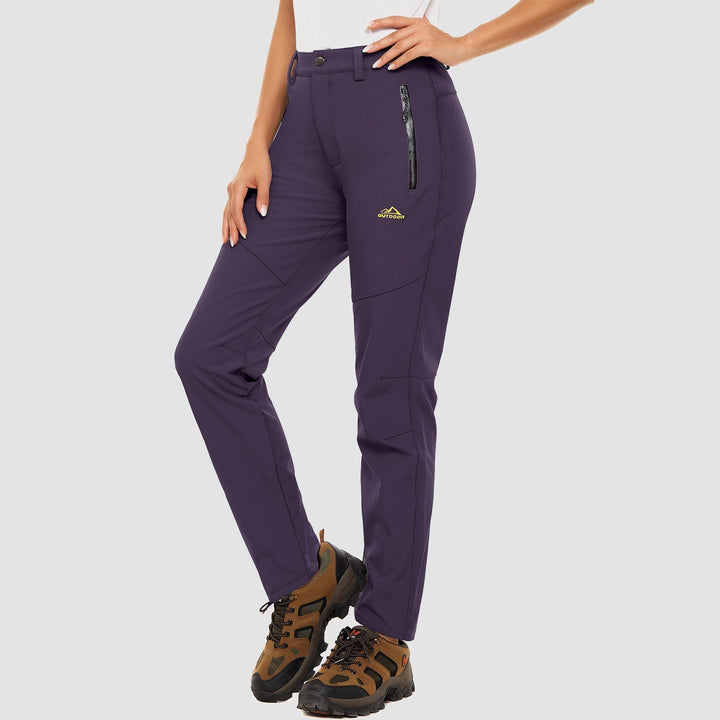 Women's performance black ski pants, stretch fabric and warm fleece lining for snow sports