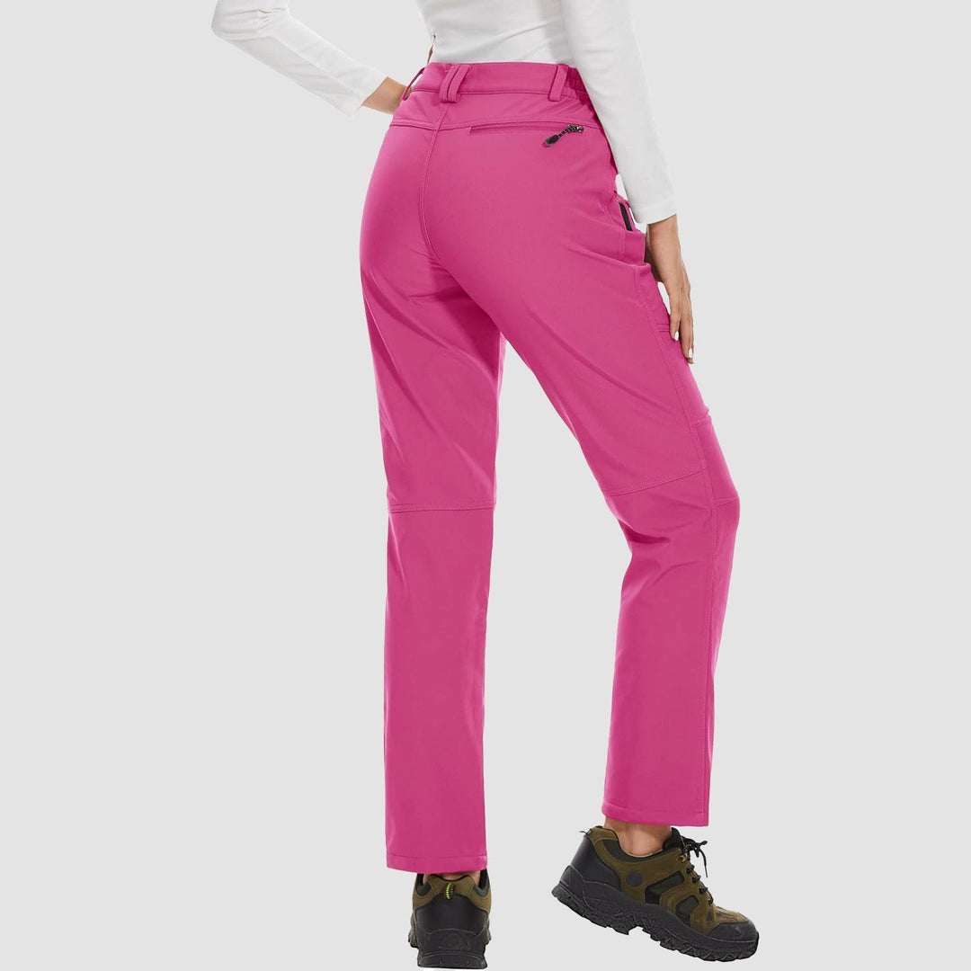 Women's high-waisted black softshell ski pants, fleece-lined and water-resistant for sports