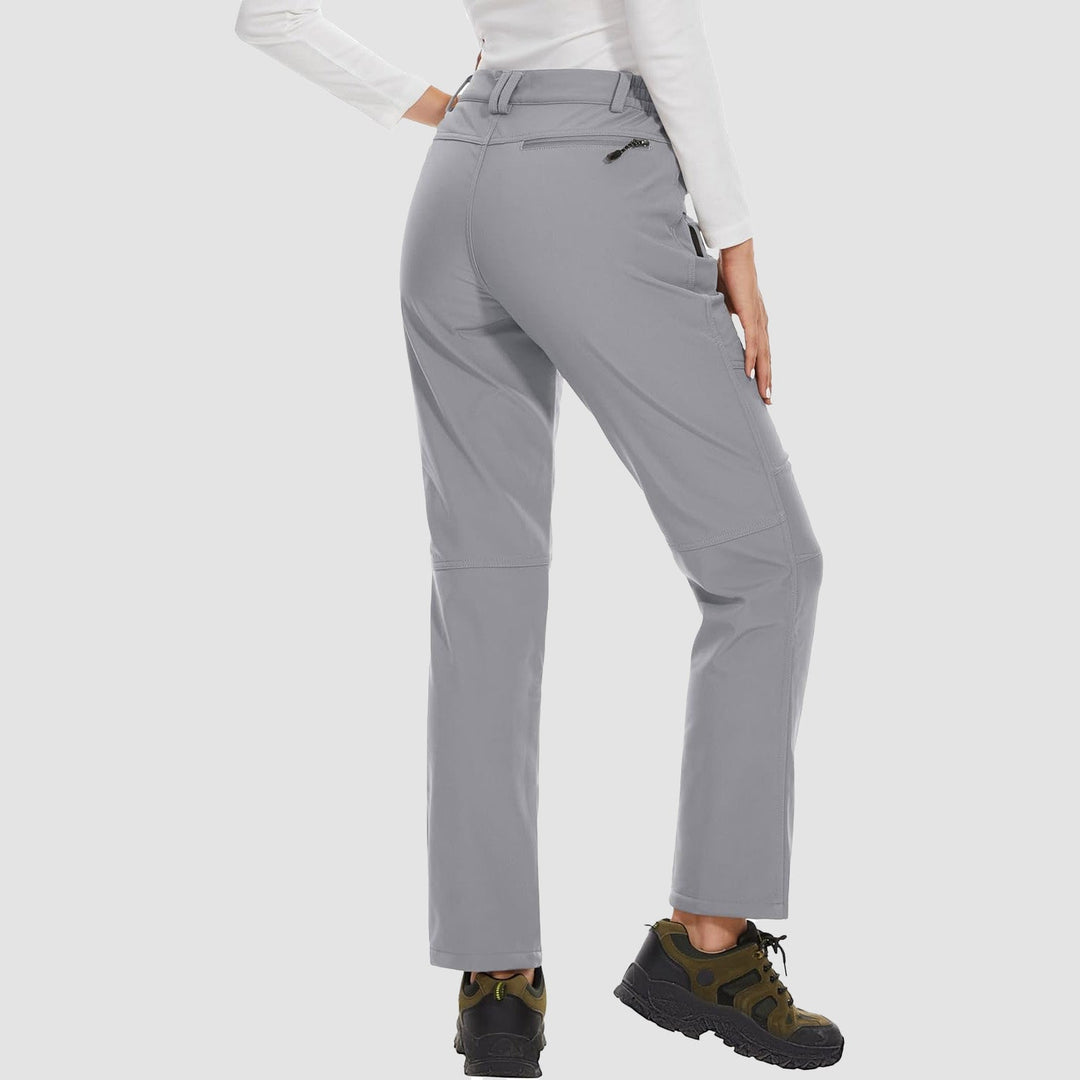 Lightweight yet warm women's grey softshell pants, fleece-lined for hiking and skiing
