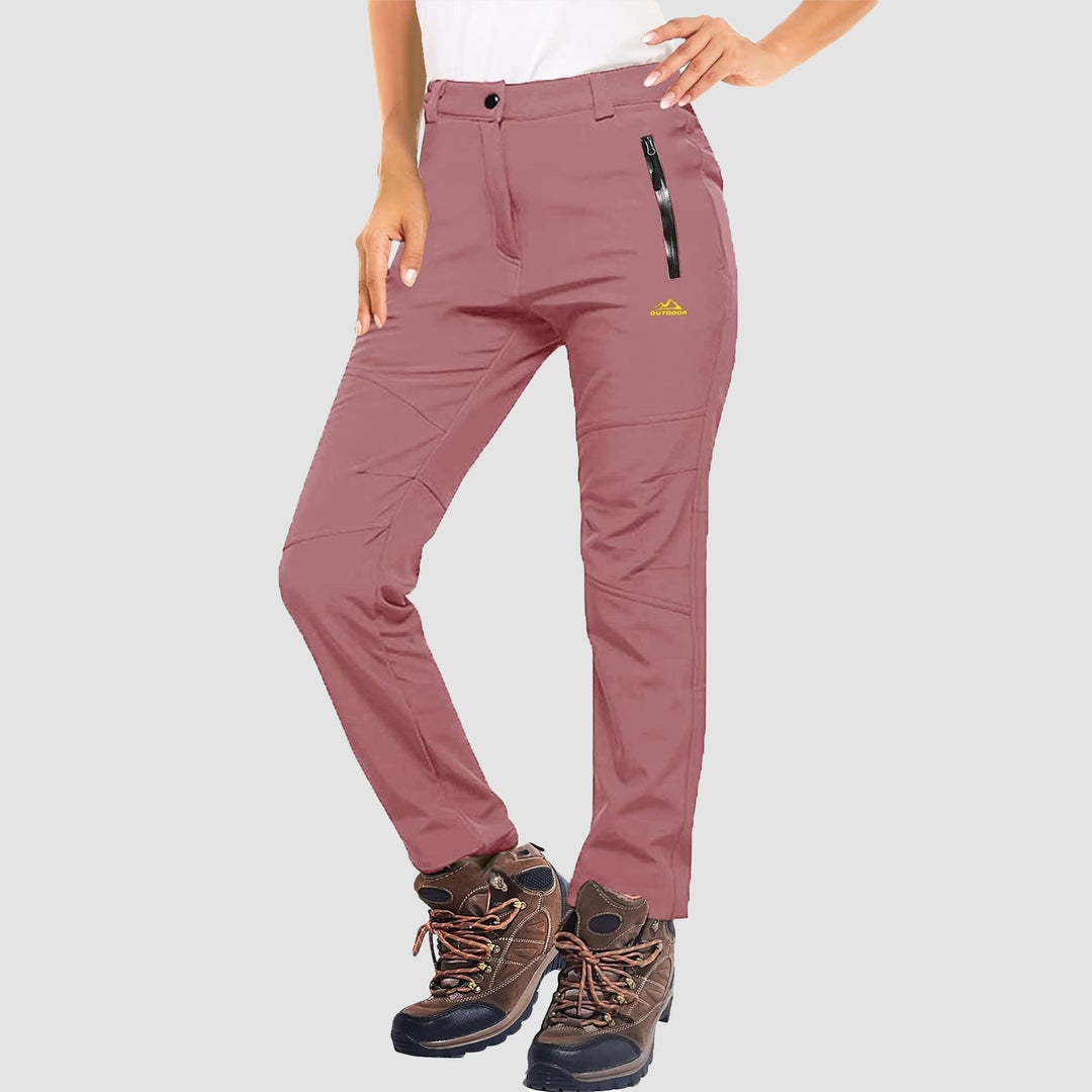 Back view of women's black outdoor ski pants, highlighting pockets and fit