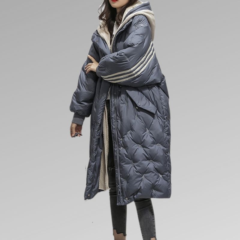 Women's black insulated long padded jacket for ultimate winter warmth and protection from cold weather.