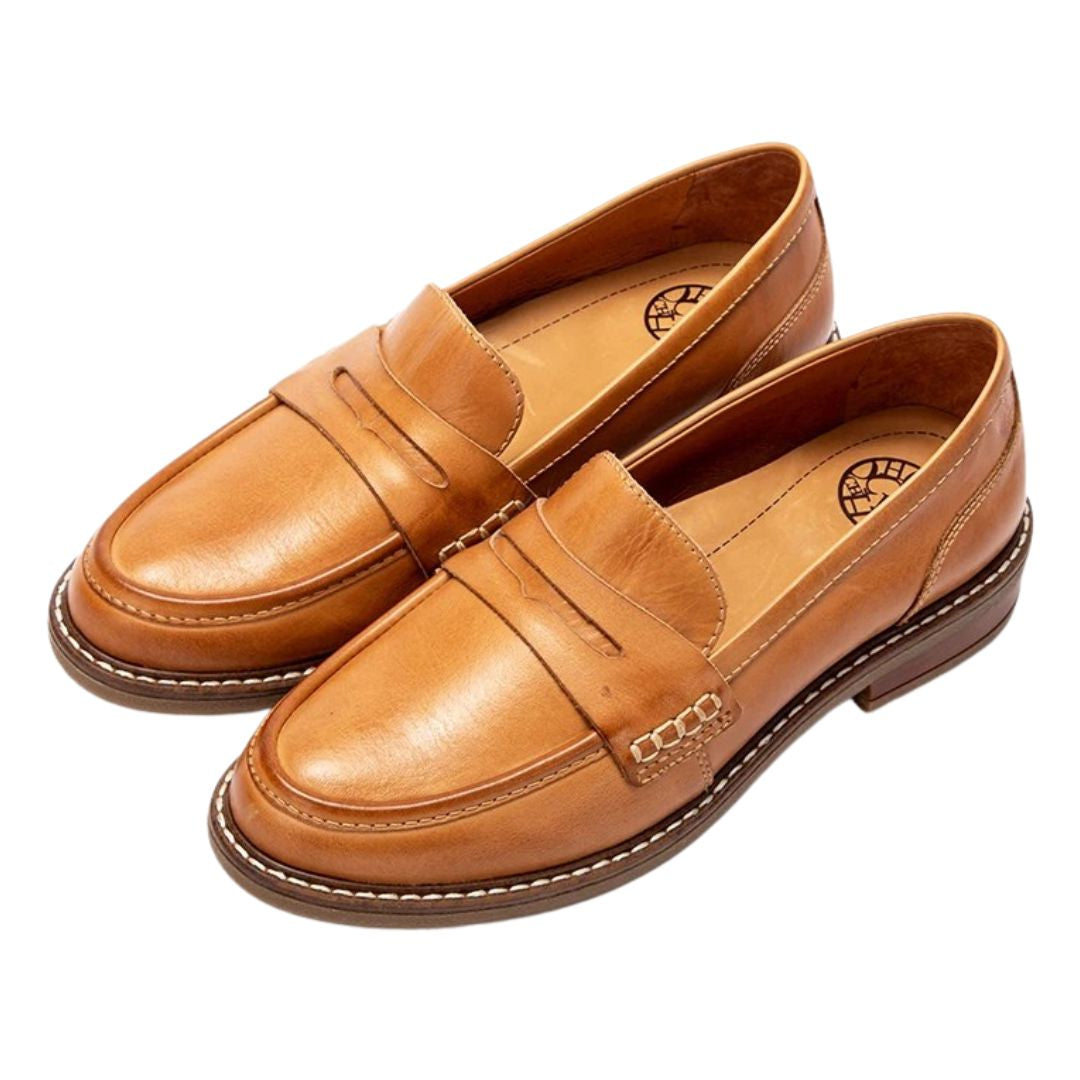 Close-up of the soft leather texture on women's comfort slip-on loafers