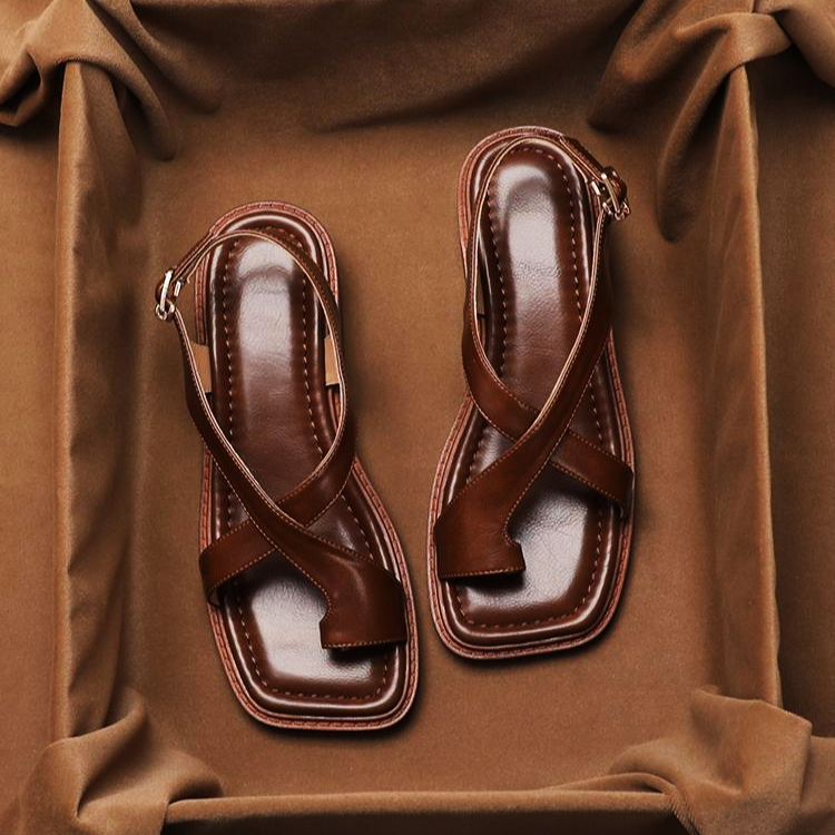 Women's adjustable cross strap leather sandals in white, offering ultimate comfort
