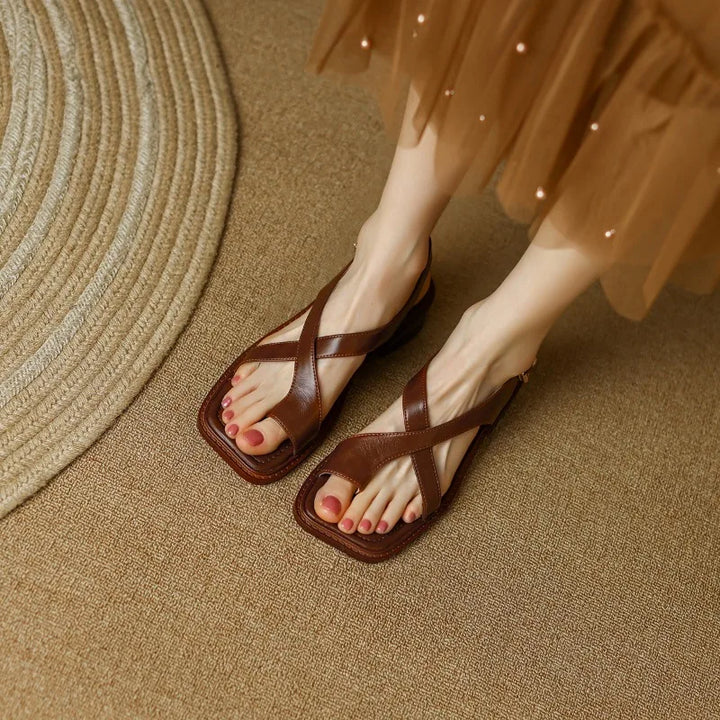 Women's summer footwear: beige leather cross strap sandals with cushioned comfort