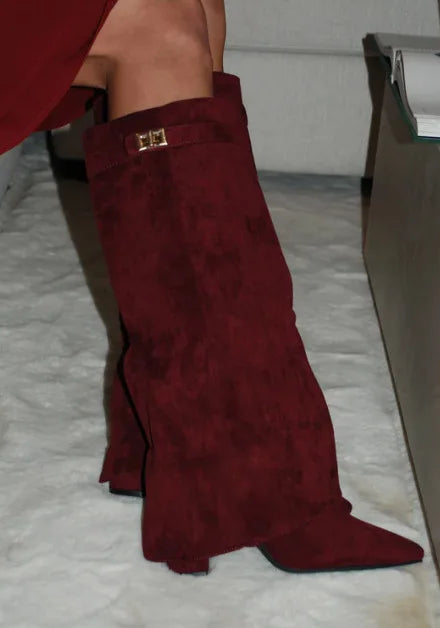 Stylish women's thigh-high boots, combining leather and buckle details